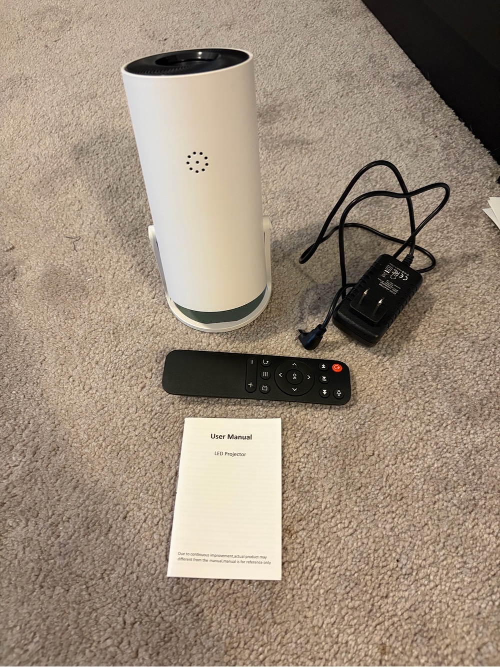 Compact White Portable LED Projector with Remote and Power Adapter - Picture 3 of 4